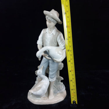 Rare Porcelain Figurine Boy with Geese,  9.25