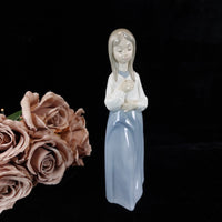 Thumbnail for NAO by Lladró 'Girl in Prayer' Figurine (1990) girl with a ribbon bookcase figur0