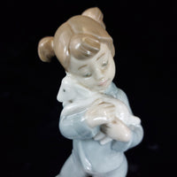 Thumbnail for Retired Charming NAO by Lladró Figurine Girl with Elephant bookcase (1980) figur4