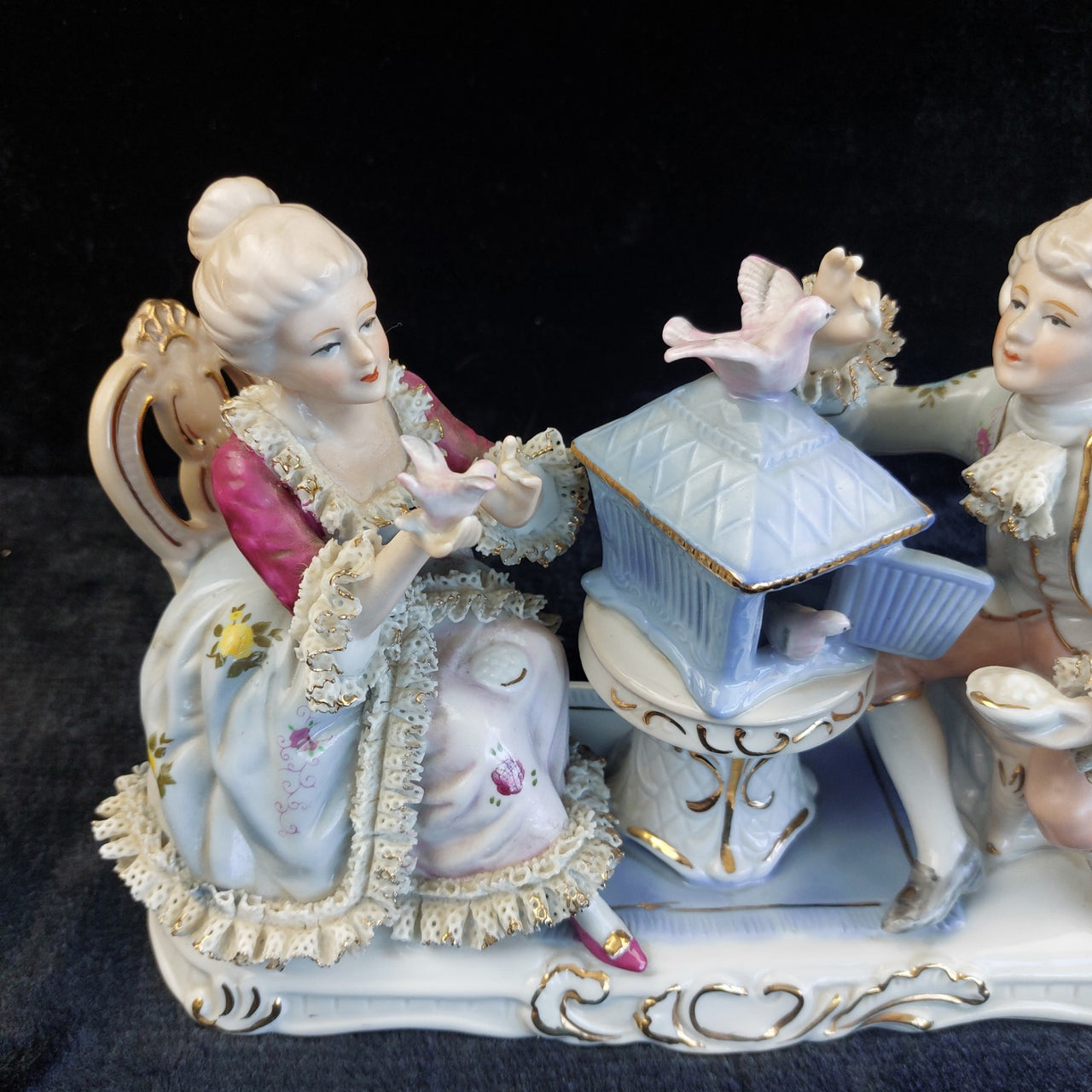 Dresden Style Porcelain Couple with Birds cage –Worn Lace & Tip Damage Gilt 9in2