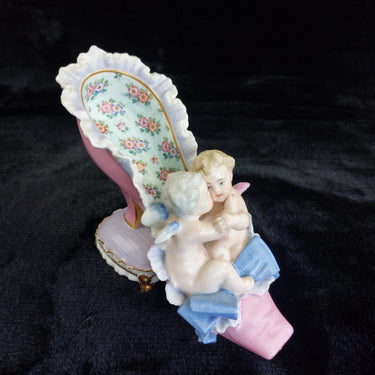 ANTIQUE MEISSEN / DRESDEN PORCELAIN HIGH HEEL SHOE FIGURINE WITH CHERUBS0