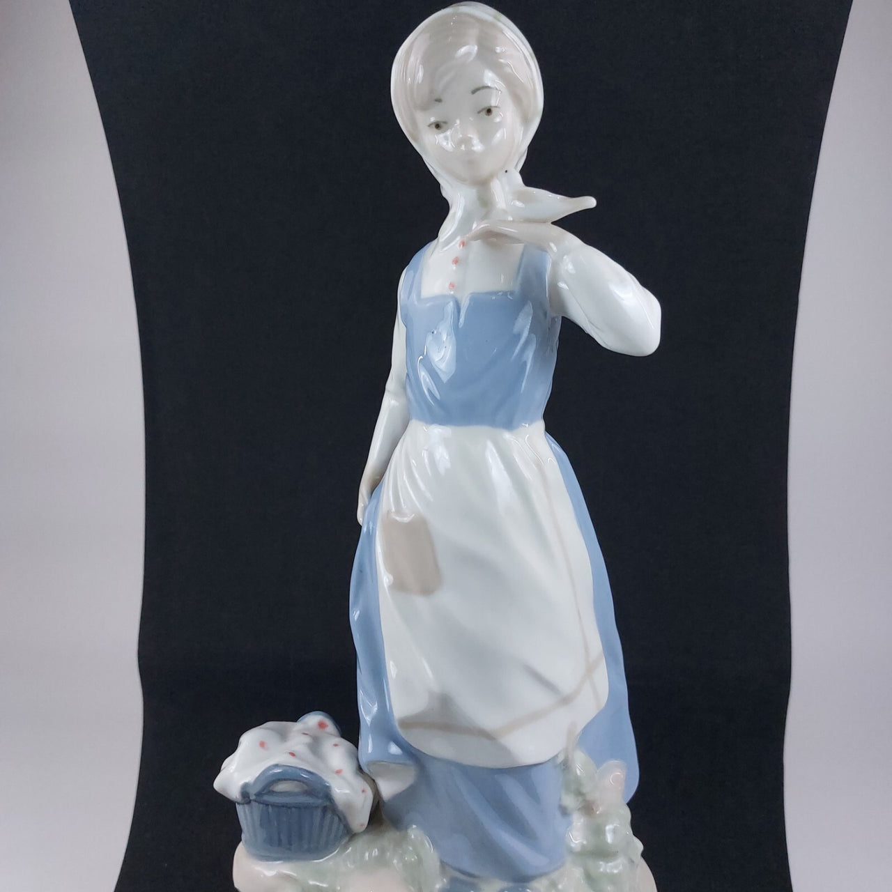 Nadal Rare, collectable Lady with Basket & Bird Figurine see pictures. 28 c.1