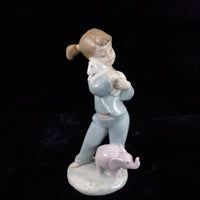 Thumbnail for Retired Charming NAO by Lladró Figurine Girl with Elephant bookcase (1980) figur2
