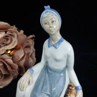 Thumbnail for TITO Spanish Porcelain Figurine - Girl with Water Jug bookcase (1970s) figure1