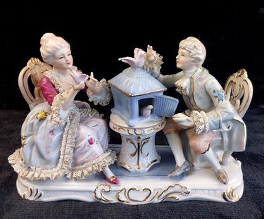Dresden Style Porcelain Couple with Birds cage 9in –Worn Lace & Tip Damage Gilt0
