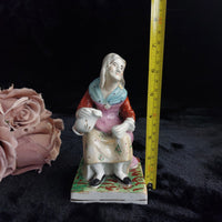 Thumbnail for Antique Staffordshire Figurineâ Woman bluescarf , holding Teapot Painted 1880.1