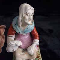Thumbnail for Antique Staffordshire Figurineâ Woman bluescarf , holding Teapot Painted 1880.2