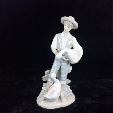 Rare Porcelain Figurine Boy with Geese,  9.25