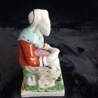 Thumbnail for Antique Staffordshire Figurineâ Woman bluescarf , holding Teapot Painted 1880.6