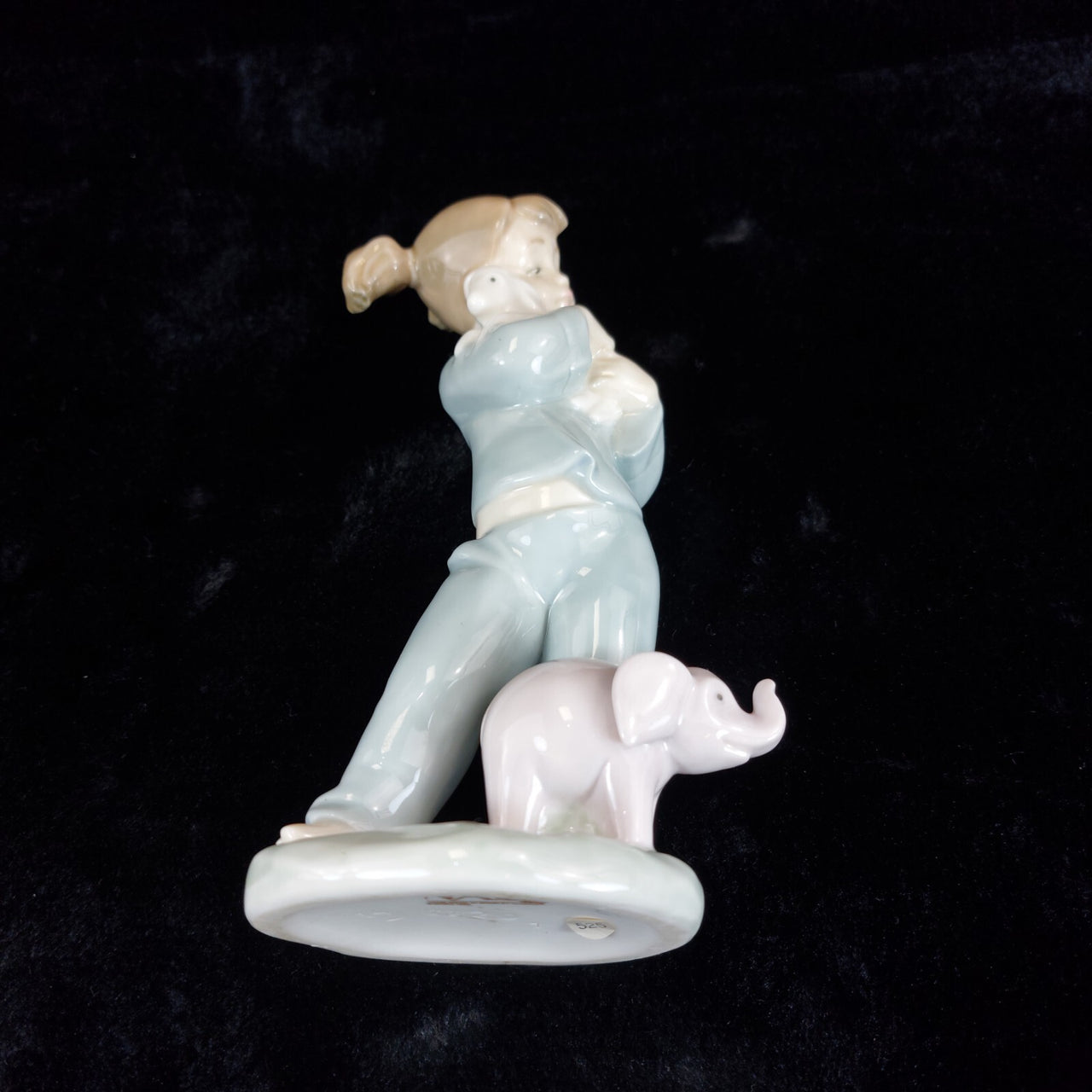 Retired Charming NAO by Lladró Figurine Girl with Elephant bookcase (1980) figur14