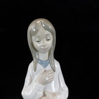 Thumbnail for NAO by Lladró 'Girl in Prayer' Figurine (1990) girl with a ribbon bookcase figur2