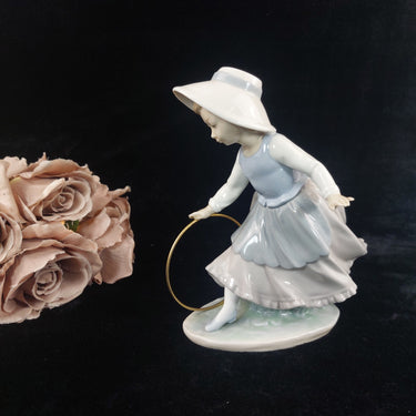 NAO Spain Girl Figurine with Hoop Glazed Porcelain  Worn Base A16M0