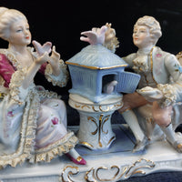 Thumbnail for Dresden Style Porcelain Couple with Birds cage –Worn Lace & Tip Damage Gilt 9in4
