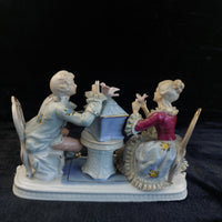 Thumbnail for Dresden Style Porcelain Couple with Birds cage –Worn Lace & Tip Damage Gilt 9in11