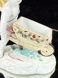 Thumbnail for Antique Cupid German Porcelain Figurine w Wheelbarrow Match Holder SPM see pics.3