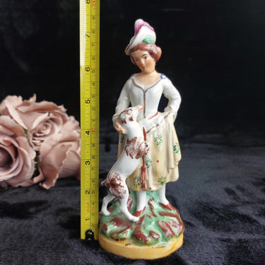 Staffordshire Figurine  Lady Dog Yellow Skirtstamp England repaired head  7.5