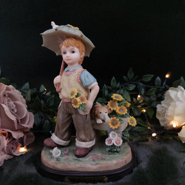 Juliana Collection Boy with Umbrella Figurine0