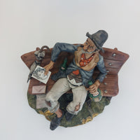 Thumbnail for Capodimonte Figurine Old Man on Bench –6.7