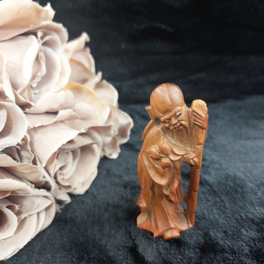 Hand-Carved Teak Wood Asian Elder Figurine – Holding Staff & Fruit 3.75