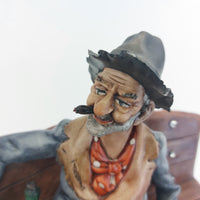 Thumbnail for Capodimonte Figurine Old Man on Bench –6.7